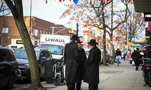 NY woman sues DMV over forced removal of head covering