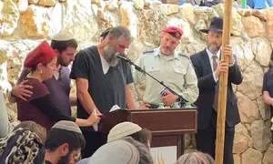 Bereaved father sings haunting song about sacrifice