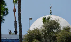 Two gunmen and security guard dead in Islamic Center shooting