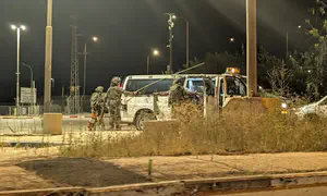 2 hurt as car thief, smuggler brieach checkpoints