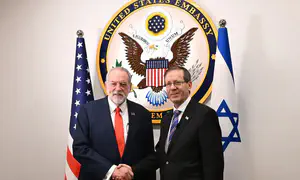 Herzog salutes America, thanks Trump