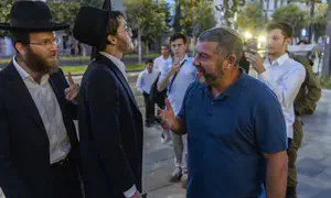 עופר וינטר וחייל חרדי הותקפו: "בוגד"