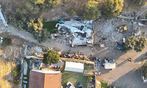 Early morning demolitions at Jewish sage's gravesite