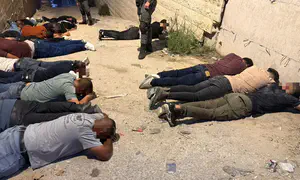 18 infiltrators found hidden under truck after police chase