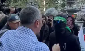 Man rips mask off protester’s face in New York