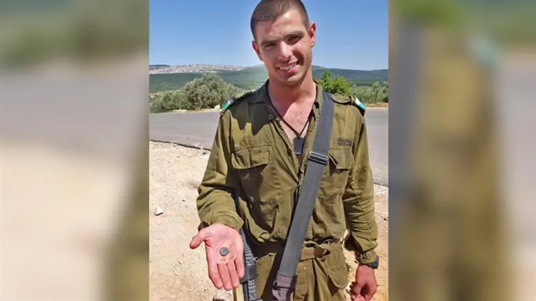 Ido Gardi with the coin