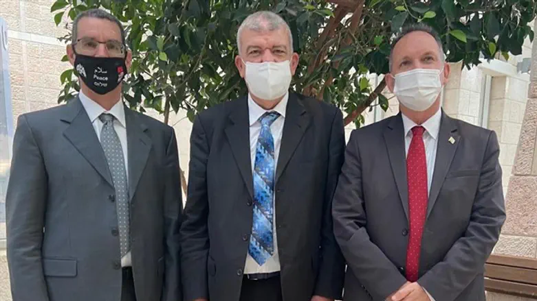 Moroccan representative (center) with Foreign Ministry officials