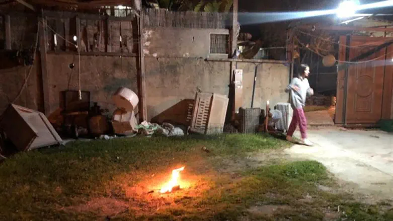 Firebomb in the yard of a home