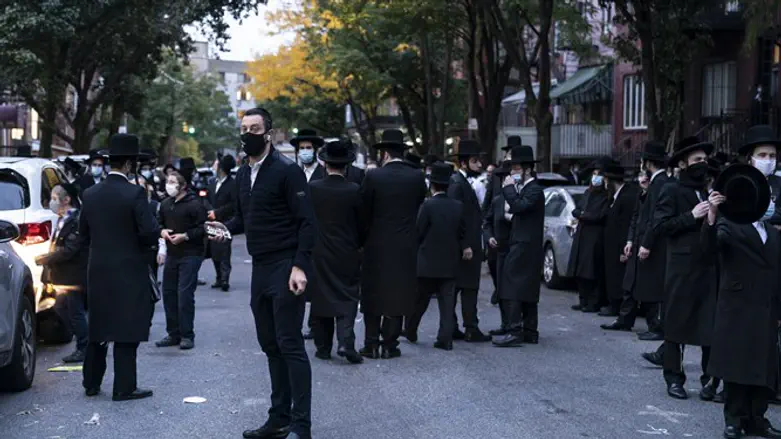 People congregate outside of Congregation Yetev Lev D'Satmar in Brooklyn