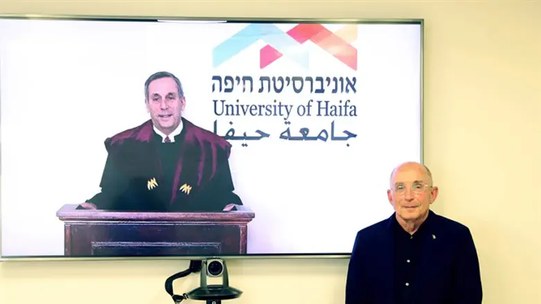 President Bacow receiving an honorary doctorate from University of Haifa.