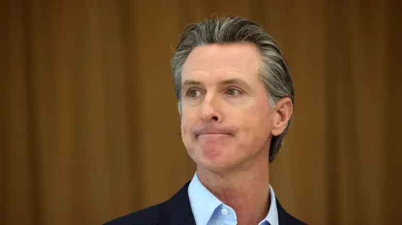 California Gov. Gavin Newsom is seen at a news conference, March 16, 2021.