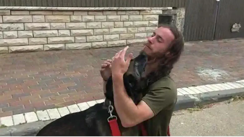 Eden, the stolen dog, greets her handler once again