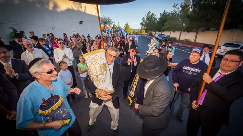 Members of Ahavas Torah in Henderson celebrate Torah dedication ceremony in the mid-2010s.