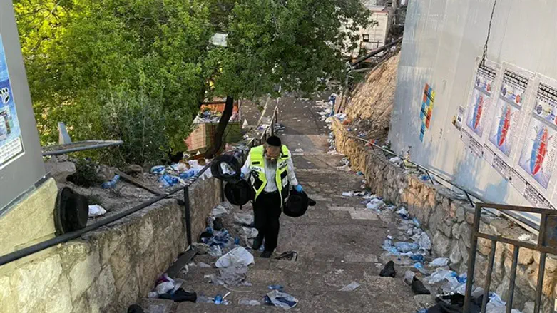 ZAKA volunteer cleaning up after the disaster