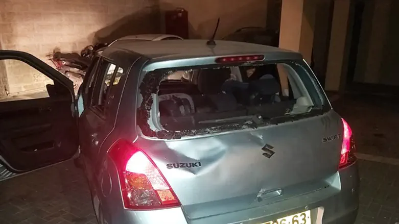 The victim's vehicle, which suffered severe damage