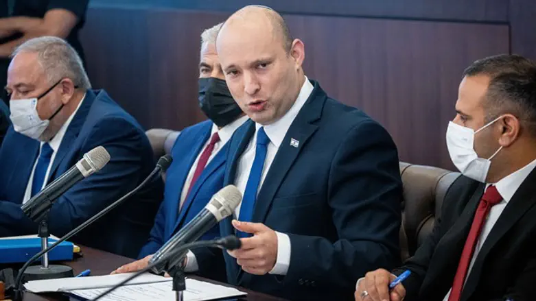 Israeli Prime Minister Naftali Bennett leads a cabinet meeting at the Prime Mini