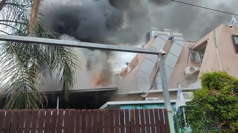 Smoke billows from the Bet Elazraki Children’s Home