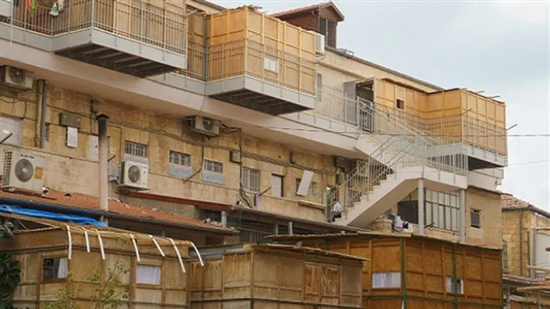 Sukkot in a religious Jerusalem neighborhood