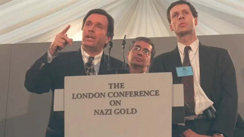 Neal Sher, left, addresses the London Conference on Nazi Gold