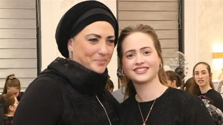 Mrs. Segal and her son's bride-to-be