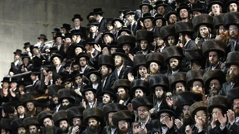 Chassidim at a "tish" gathering