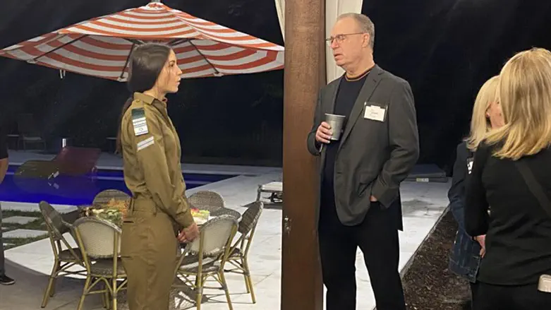 Jason Gold speaking with Avishag Semberg