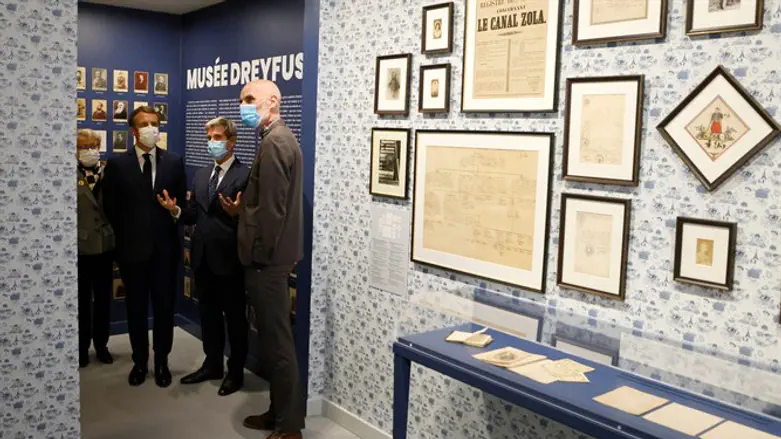 Emmanuel Macron, third from right, visits the Dreyfus Museum in Médan near Paris
