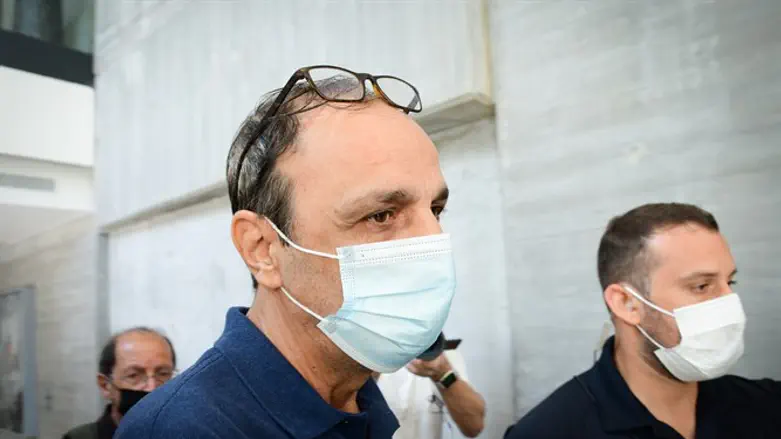 Shmuel Peleg arrives for a court hearing over charges of kidnapping grandson Eitan Biran