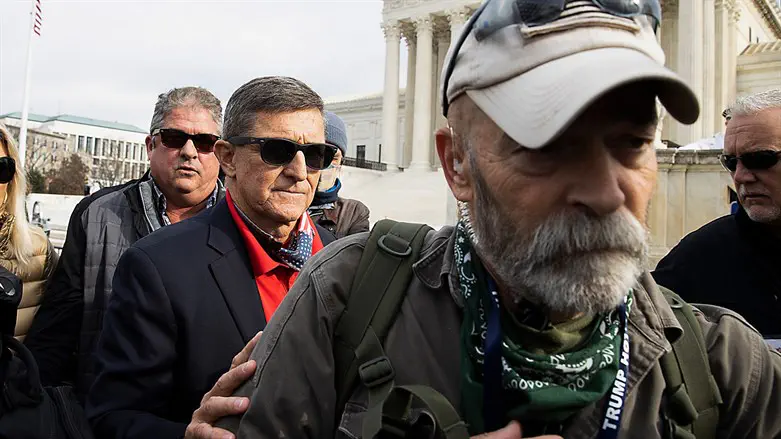 Former General Michael Flynn departs a protest of the outcome
