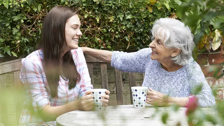Teenage girl and elderly woman