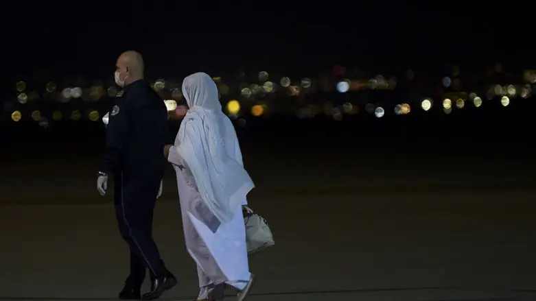 An Afghan woman arrives in Kosovo after fleeing Kabul, Aug. 29, 2021.