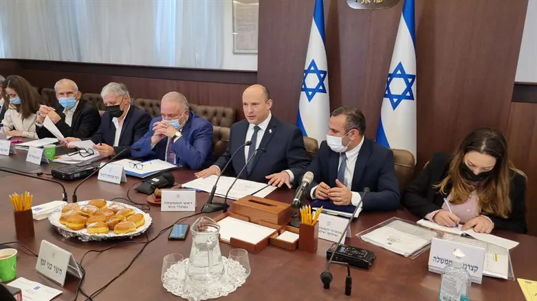 PM Bennett at a government meeting