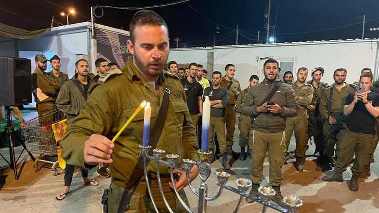 At Netzah Yehuda's Hanukkah candle-lighting event in Beit El