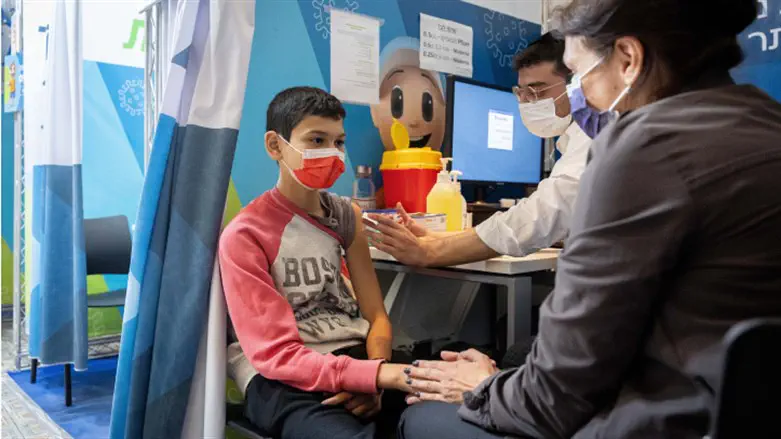 Boy receives first dose of the COVID vaccine