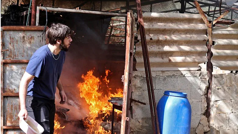 Arab man tries to extinguish fire allegedly sparked by Israelis in Burqah