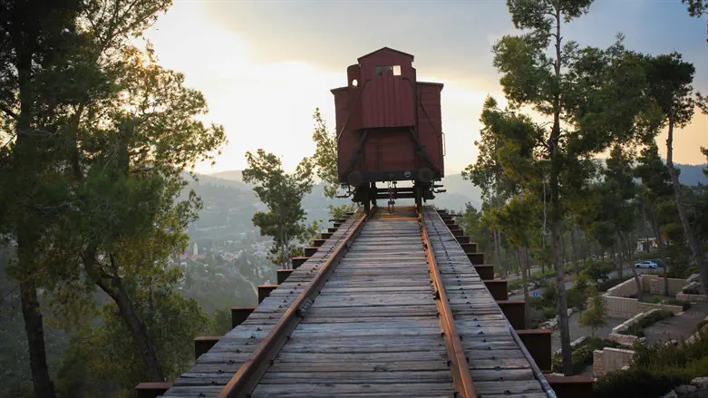 Train stands at end of train tracks at Yad Vashem Holocaust memorial museum