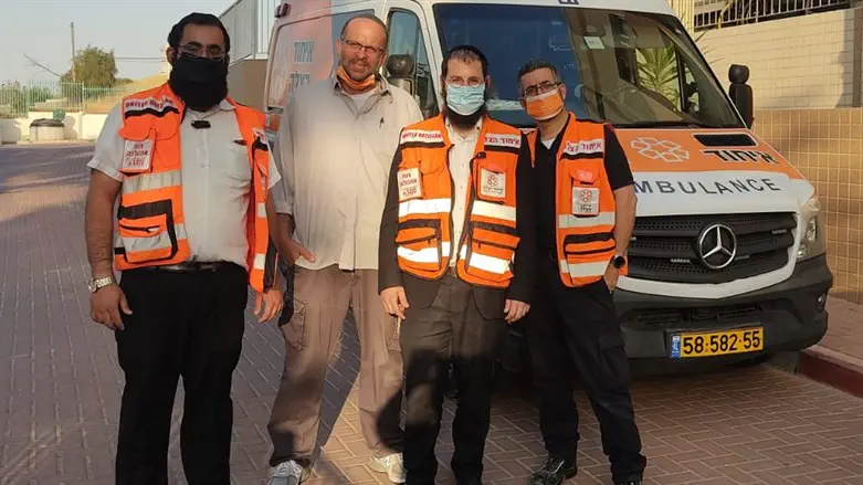 Yakov Hilel Praytet (2nd from right) and other UH volunteers