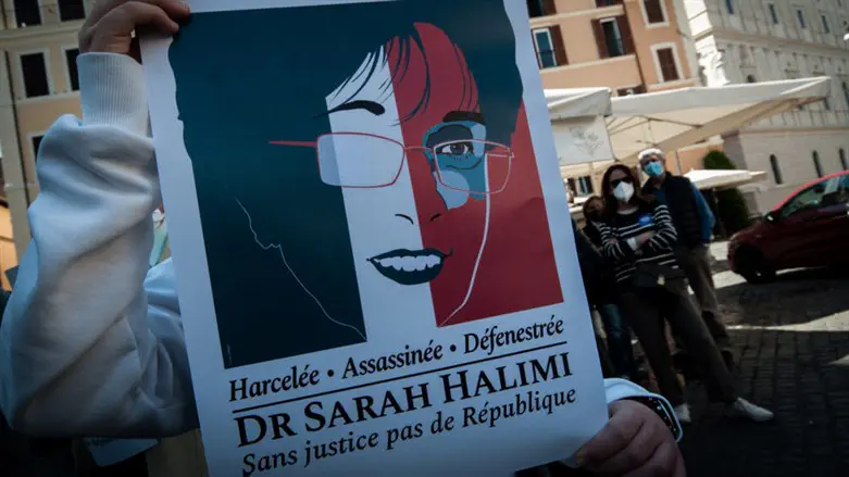 hold signs protesting the "Halimi affair" near the French Embassy in Rome