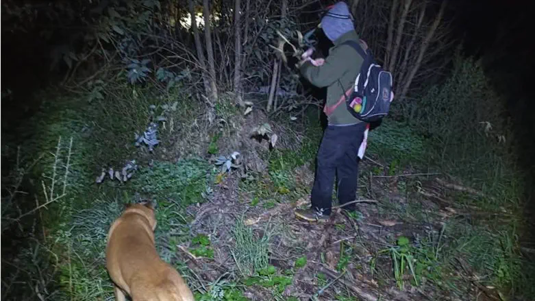 IDU volunteer during nighttime search operations