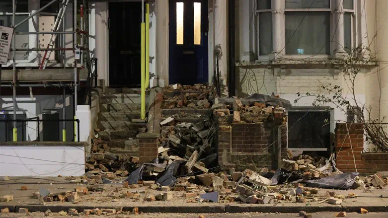 Debris from the rooftops of three houses torn off during storm Eunice