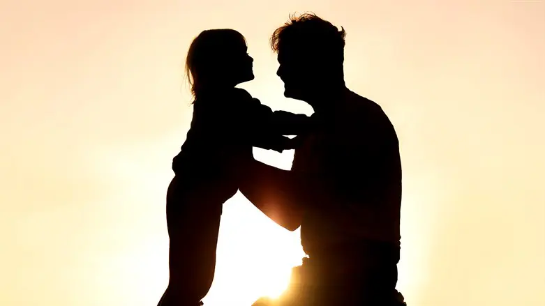 Father hugs daughter