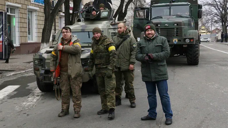 Konstantyn Batozsky, right, stands with fellow Ukrainians in Donetsk