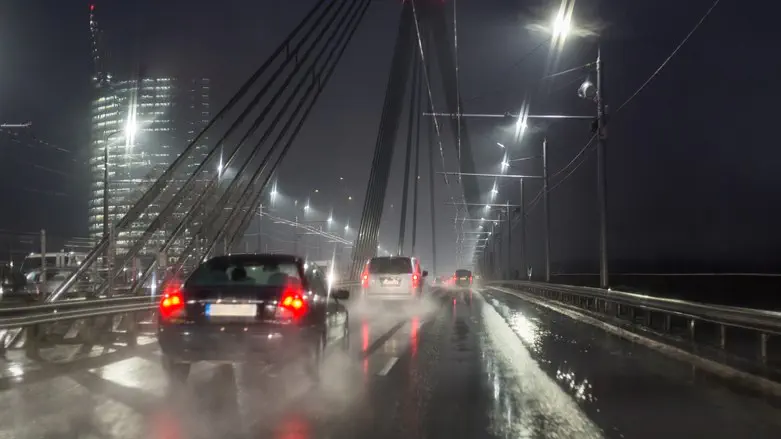 Vehicle in the rain (illustrative)