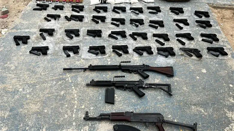 The confiscated weapons, ammunition, and drugs