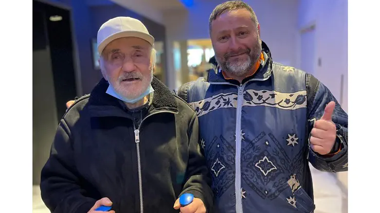 Evgeny Pavlovskiy and his son, Mykhailo Pavlovskiy, reunited in Warsaw