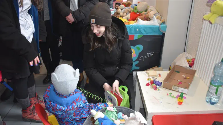 Delivering backpacks to refugees