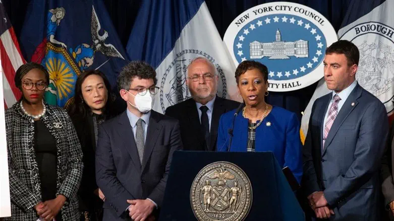 Adrienne Adams flanked by council members and Rabbi Abraham Cooper