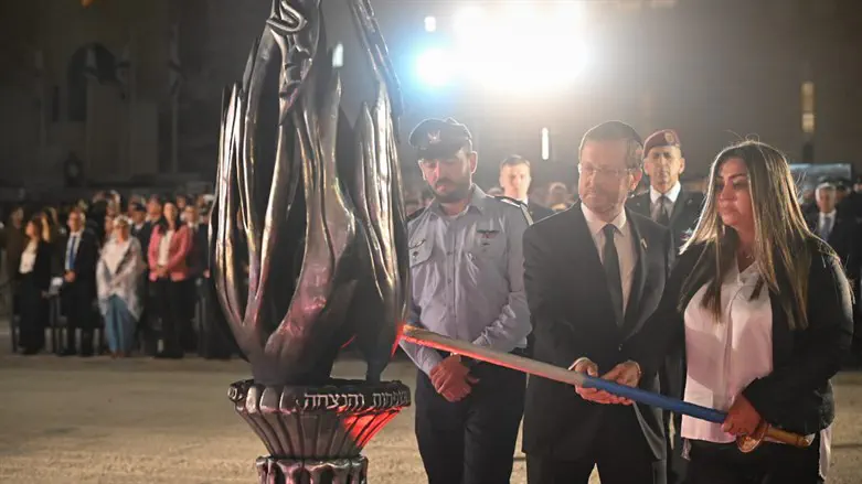 President Herzog lights memorial torch at Memorial Day ceremony