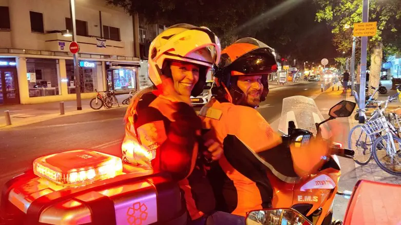 Jennifer and Liran on Liran's ambucycle
