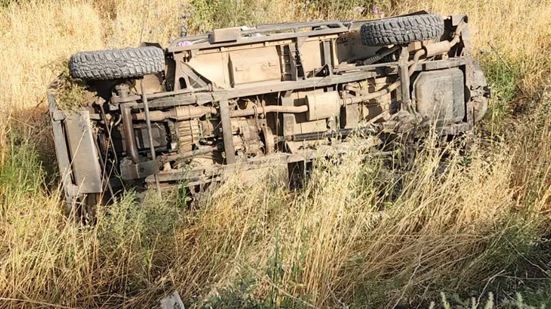 Jeep overturns